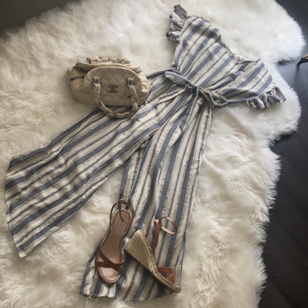 Never worn!    Blue and white striped romper